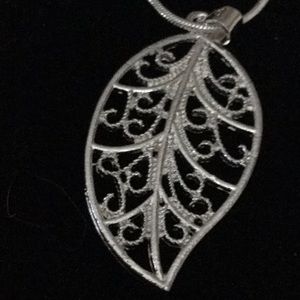 Sterling silver necklace with charm